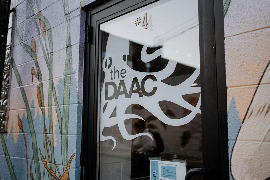 Glare shines on The DAAC's front door, unit #4