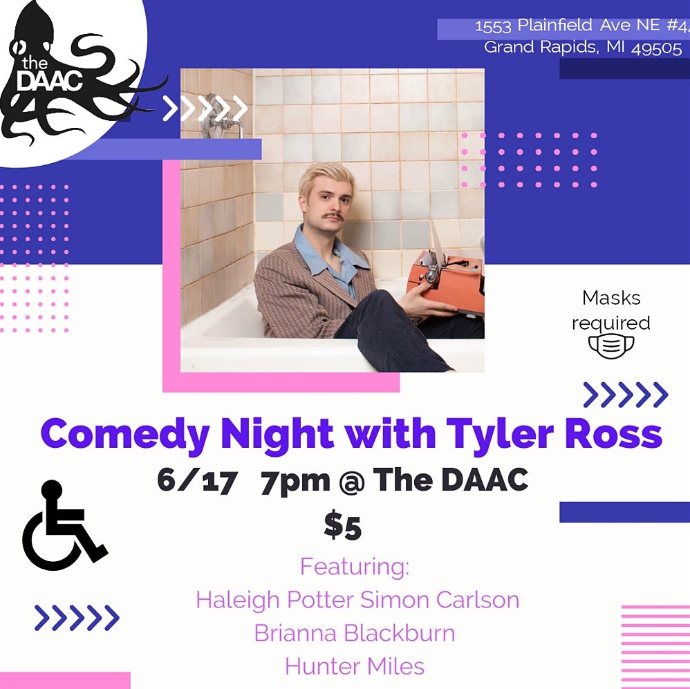 Comedian sitting fully clothed in an empty bathtub, holding a typewriter