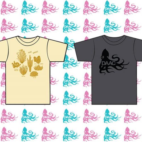 Cream colored cactus print T-shirt and Grey T-shirt with Black DAAC logo